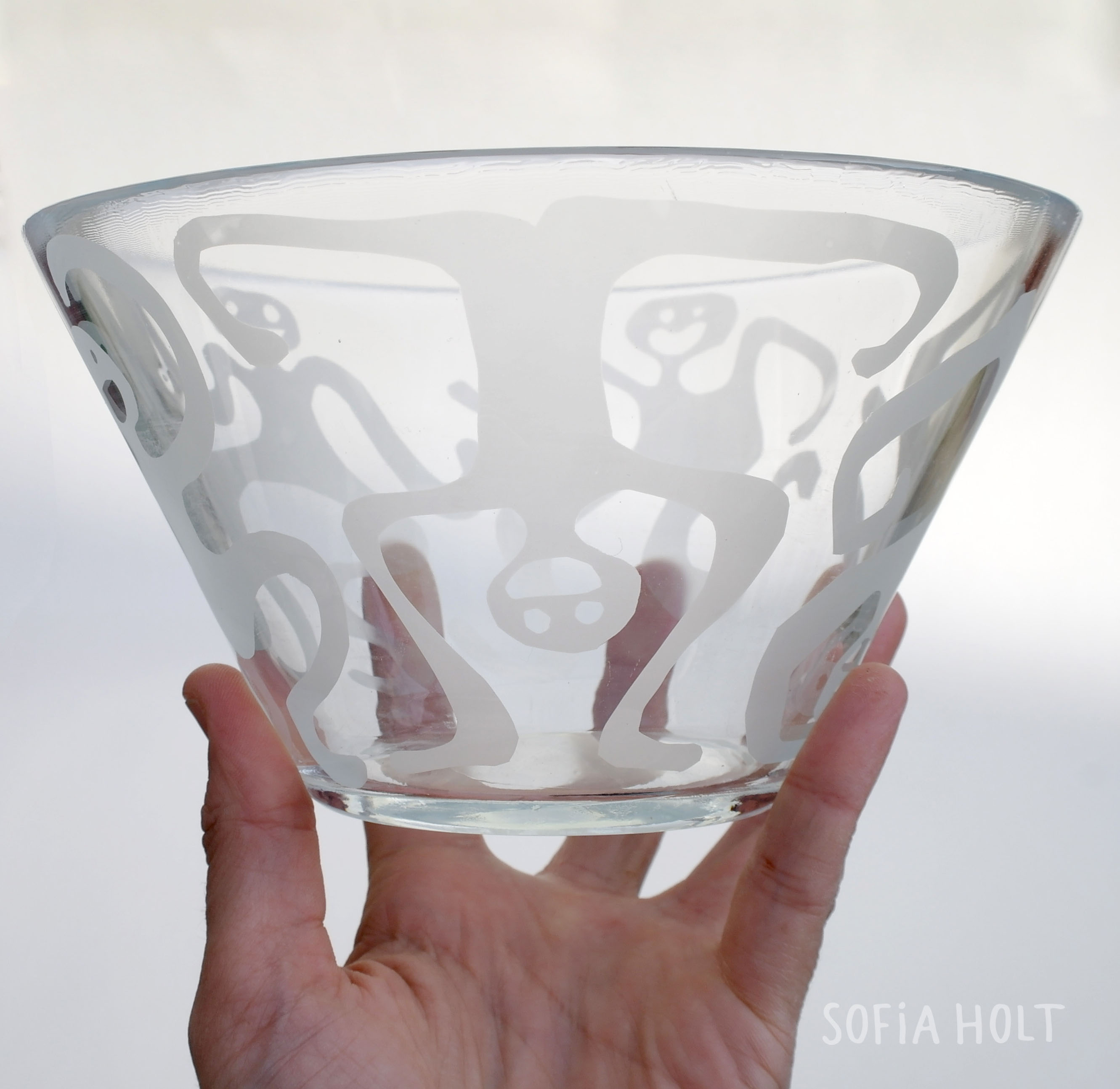 Glass bowl in hand s