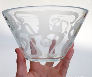 Glass bowl in hand s