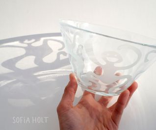 Glass bowl in hand shadow s